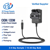 Adaptateur secteur AC/DC, prise UK, 12V 2A, 24V 1A, OEM ODM, logo personnalisé, alimentation à découpage, UKCA CE, directement de l'usine