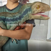 Dinosaure animatronique armé ou marionnette à vendre, ou Velociraptor interactif pour centre de divertissement pour enfants