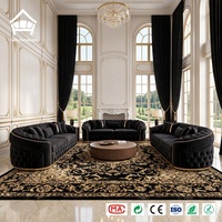 Ensemble de canapés italiens courbés en velours noir capitonné, style luxe discret, avec table basse à tambour cannelé – Solution complète pour l'ameublement de la maison