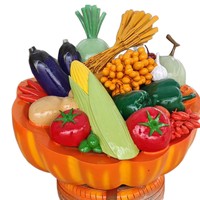 Buitenverlichting met sprookjesachtige muziek, glasvezel fruit- en groenterekwisieten, grote pompoen, paprika, radijs, kool