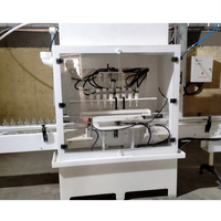 Machine d'emballage automatique haute précision pour liquides (huile, détergent, eau de Javel, nettoyant WC) en PP et HDPE, anti-corrosion, à remplissage par gravité