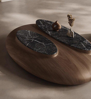 Table basse ovale en bois massif de noyer noir, design minimaliste pour grand appartement, combinaison de tables de salon au design épuré