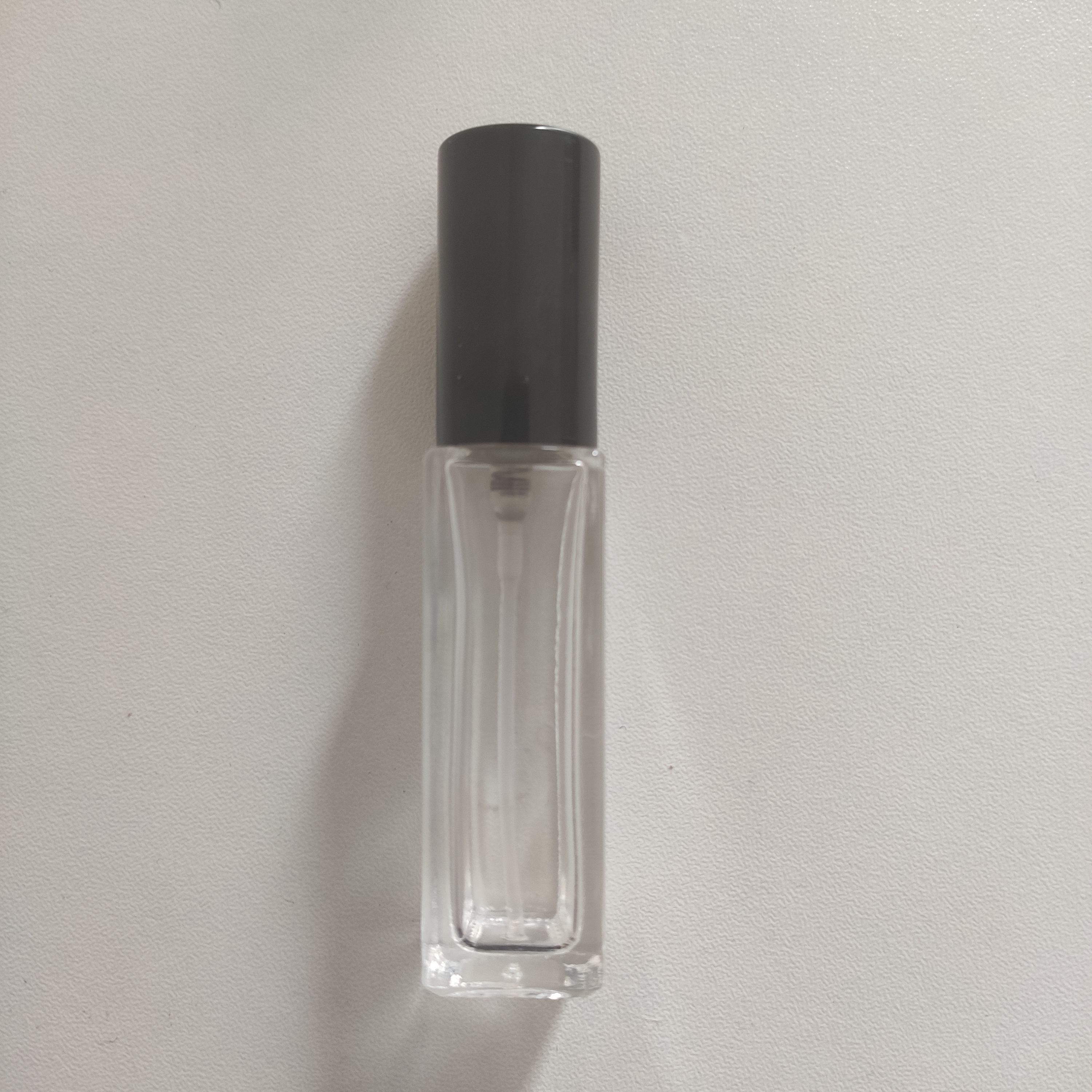 Bottle with black top