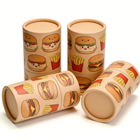 Emballage en tube cylindrique en carton écologique fait main à motif burger et frites, avec matériaux recyclés pour la restauration rapide et les collations