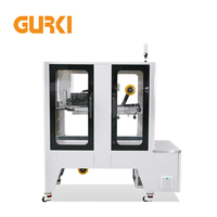 Machine de scellage et d'étiquetage automatique de cartons de boissons GURKI GPETB-40 avec ruban adhésif électrique, entraînement supérieur et inférieur