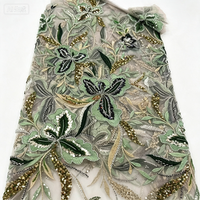 Tissu en dentelle brodée de sequins
