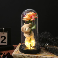 Rose éternelle artisanale avec un adorable ours en peluche qui s'abîme dans une dôme acrylique, cadeau romantique créatif pour la Saint-Valentin, vente en gros