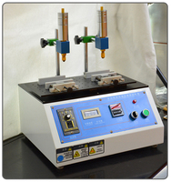 Testeur automatique de résistance à l'usure par l'alcool, utilisé pour les tests en laboratoire, pour évaluer la résistance aux rayures et à l'abrasion des produits enduits