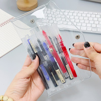 Vente en gros de sac à stylo transparent pailleté pochette holographique à crayons en PVC enveloppe porte-monnaie avec sacs de rangement à bouton pression