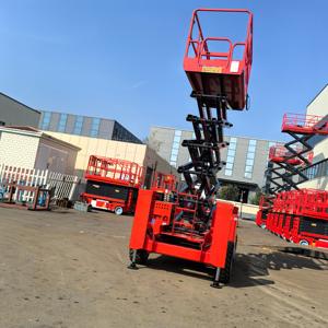 10 मीटर की ऊंचाई के साथ एक कैंची लिफ्ट प्लेटफॉर्म को स्थानांतरित या तय किया जा सकता है, जो उच्च ऊंचाई वाले संचालन की दक्षता में सुधार करता है। - Product Image 1