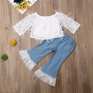 Venta al por Mayor de Conjuntos de Ropa para Niños, Estilo Nuevo, Camisetas Blancas y Pantalones Hip Hop - Product Image 1