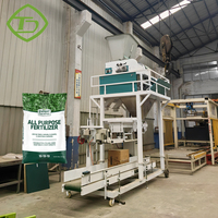 Machine de conditionnement d'engrais intelligente Balance de remplissage et de pesée de sacs de 10 à 50kg entièrement automatique pour la production en usine