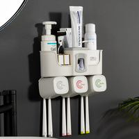 Porte-brosse à dents mural de salle de bain, 4 tasses, porte-distributeurs de dentifrice sans perforation, porte-coins de salle de bain