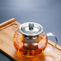 Théière moderne écologique en verre résistant à la chaleur avec filtre épaissi Conception de fleur de pommier pour le brassage du thé domestique