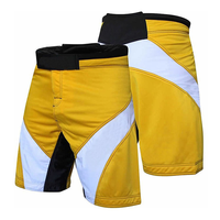 Shorts de combat MMA personnalisés en toile 100% polyester, taille élastique mi-haute, respirants, séchage rapide, motif uni, style décontracté, entraînement pour hommes