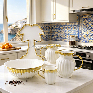 Ensemble de vaisselle en céramique YDY Factory avec bordure dorée et motifs en relief, comprenant pichet à jus, bol, assiette et tasse, idéal pour servir des jus algériens, coffret cadeau 9 ou 10 pièces - Product Image 1