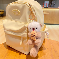 Dessin animé loutre en peluche porte-clés pendentif poupée créative pour étudiant sac d'école petit Couple cadeau en gros