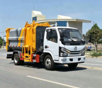 Nouveau camion à ordures compacteur diesel manuel 4x2 de 3-4 m³ à chargement latéral