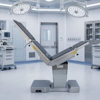 Table d'opération électrohydraulique multifonctionnelle avec bras en C et rayons X pour hôpital