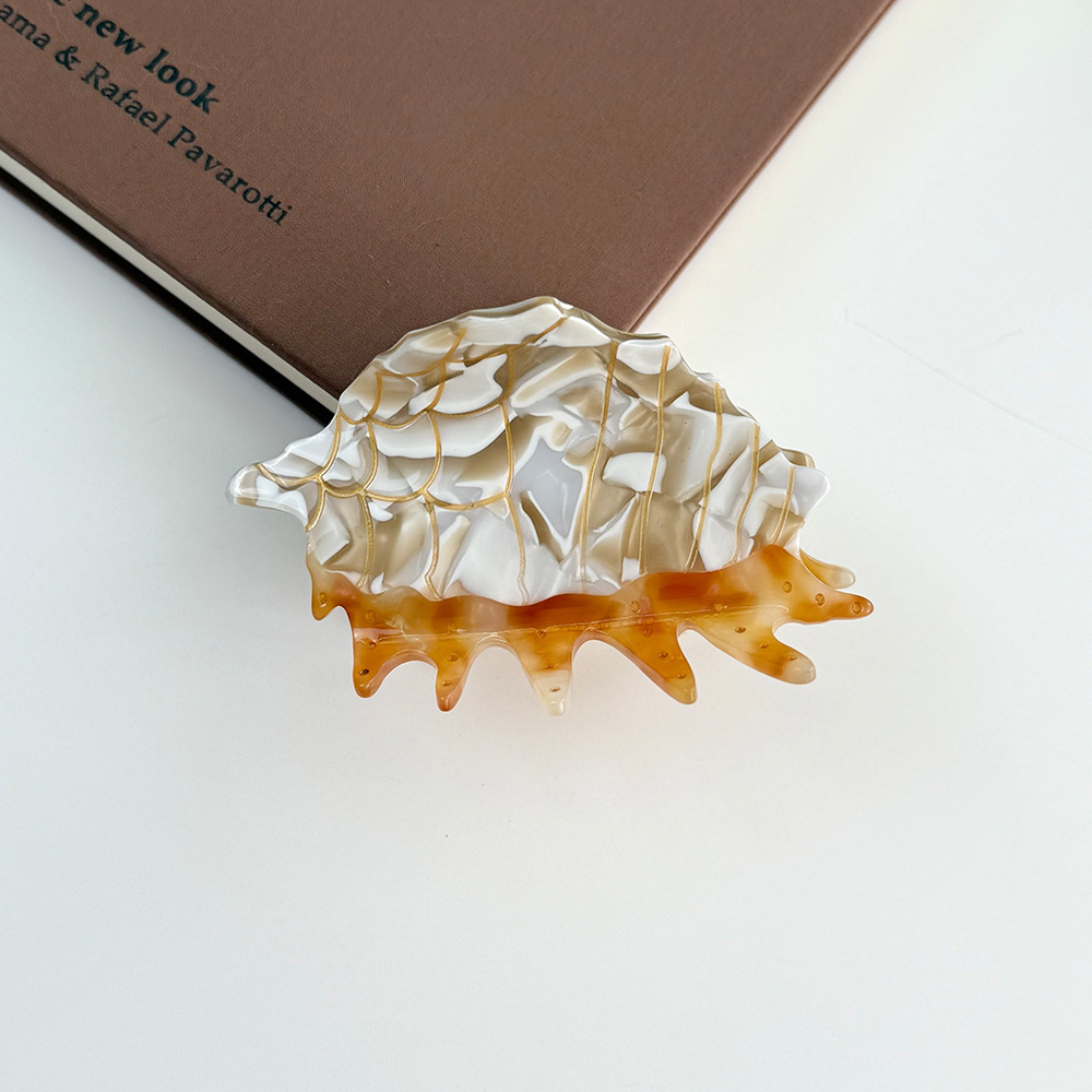 9 caracolas marrones 9*5cm 28g