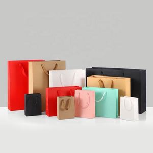 Bolsa de Compras de Papel Kraft Beige Crema de Lujo Reciclado con Asa de Cinta y Lazo con su Propio Logotipo para Empaque de Regalos, Impresión Personalizada - Product Image 1