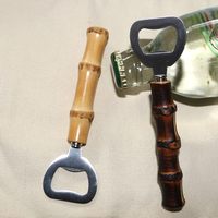 Abrebotellas de cerveza con tapa de acero inoxidable con mango de raíz de bambú único