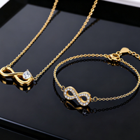 Ensemble Collier Symbole Infini Saint-Valentin et Bracelet Breloque Zirconium en Acier Inoxydable Doré Pendentif Bijoux de Mode Femme Cadeau