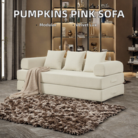Canapé modulable Chesterfield grand format en chenille rose, confortable et capitonné, pour salon, salle de sport ou villa