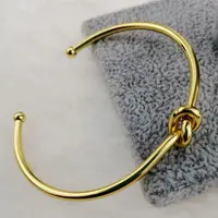 AmorYubo braccialetto affascinante elegante da donna in oro 14K con nodo d'amore all'ingrosso in fabbrica