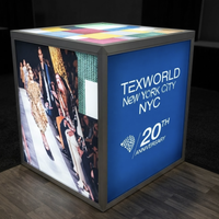 Stand d'exposition personnalisé 20x20 avec écran rétroéclairé SEG et support TV pour Texworld New York City Été 2027