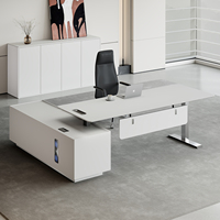 Chef de bureau intelligent Chef de direction Table électrique réglable en forme de L Bureau assis debout Pieds en acier inoxydable