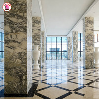 Colonnes en marbre poli noir et blanc à motifs personnalisés, grands piliers en pierre naturelle, idéaux pour les bâtiments commerciaux et les halls d'hôtels de luxe