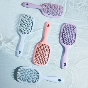 Nouvelle conception de peigne à cheveux creux en plastique, brosse à démêler les cheveux humides et secs, brosse à cheveux ventilée incurvée de haute qualité pour femmes - Product Image 4