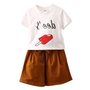 Conjunto de Ropa de Algodón Indio: Pantalones y Camiseta Ringer para Niña con Detalle de Mano - Lote de Stock - Los Diez Productos Más Vendidos en China - Product Image 1