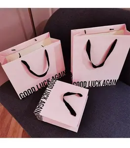Logotipo personalizado, bolso rosa de moda, tienda de ropa de regalo de gama alta engrosada, embalaje de bolsa de papel de gama alta