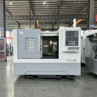 Tour CNC de haute précision TCK50 pour travaux lourds |   Centre d'usinage à lit incliné avec commande CNC FANUC, guides linéaires et mandrin hydraulique