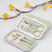 Kit de manucure et pédicure en acier inoxydable pour usage domestique, avec lime à ongles, cure-oreille, ciseaux à sourcils et repousse-cuticules