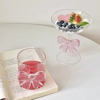 Vente en gros de tasses à thé en verre à nœud 3D faites à la main de style mignon personnalisé tasse à café en verre à haute teneur en borosilicate tasses à vin à nœud rose pour cadeau