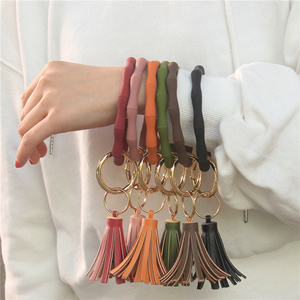 Pulsera de silicona giratoria de onda de bambú, llavero con borla de cuero PU, llavero antipérdida para <span class=keywords><strong>coche</strong></span>, anillo de <span class=keywords><strong>muñeca</strong></span> - Product Image 1