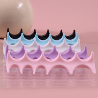 Nouvel outil de manucure 2 en 1 : séparateur d'orteils en silicone en forme d'arête de poisson et support pour stylo à ongles
