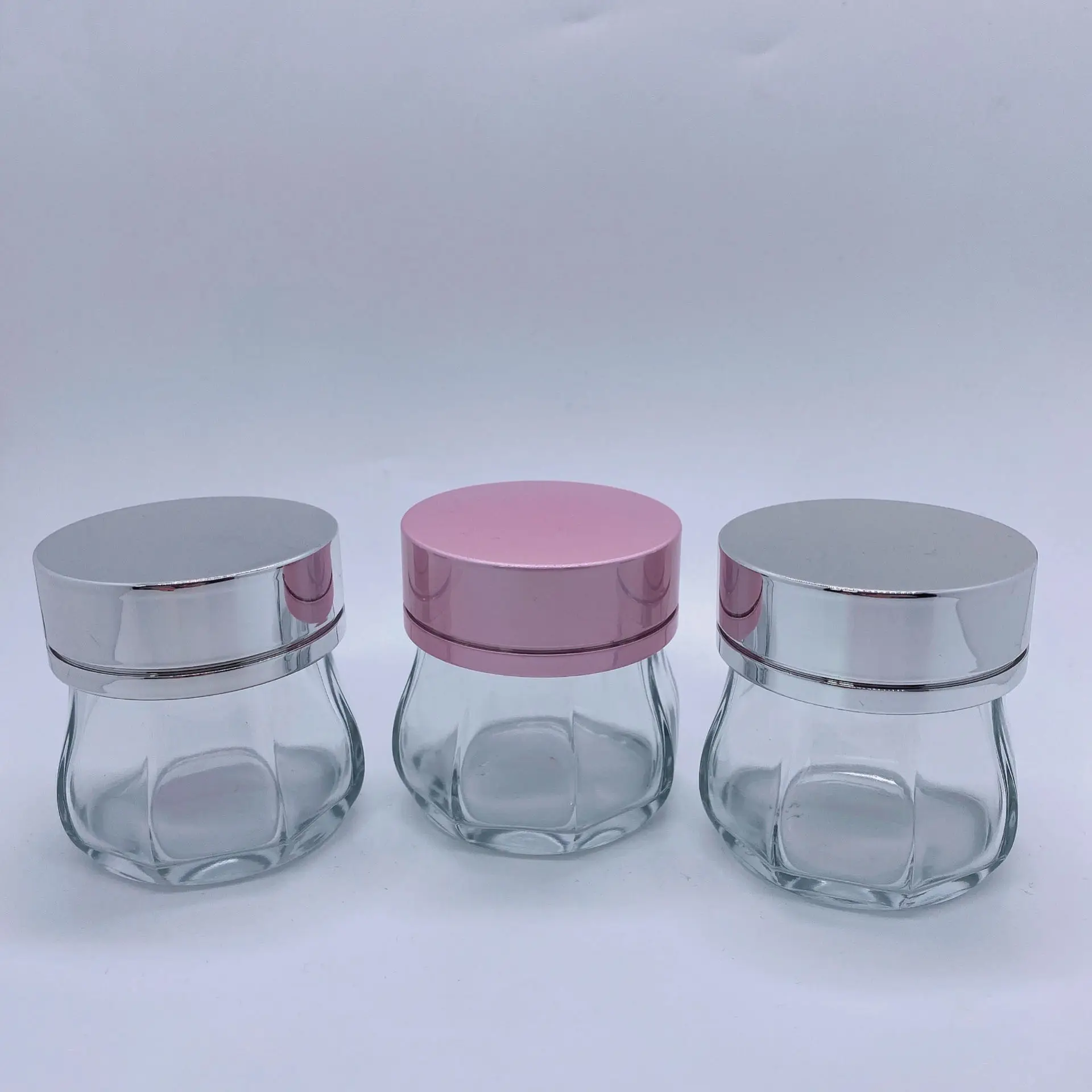Customized octagonal clear body cream jar 100ml big jar glass container with silver pink cap