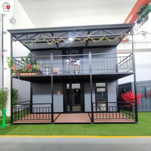 บ้านพักตากอากาศสำเร็จรูปหรูหราทันสมัยแบบพกพา 2 ชั้น ขนาด 20/40 ฟุต แบบขยายได้ ดีไซน์พับเก็บได้ ใช้เป็นบ้านพักตากอากาศหรือสำนักงาน - Product Image 1
