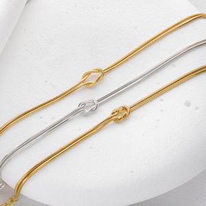 Minimalista placcato in oro 18K catena di <span class=keywords><strong>serpente</strong></span> Love Knot <span class=keywords><strong>bracciale</strong></span> donne gioielli impermeabili amicizia in acciaio inossidabile coppia braccialetti - Product Image 6
