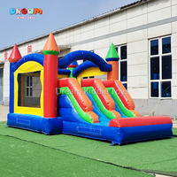 Château gonflable avec double toboggan, fourni par l'usine