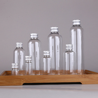 Vente en gros de bouteilles en plastique PET transparentes à petite ouverture avec couvercles à vis en aluminium pour emballage de liquide