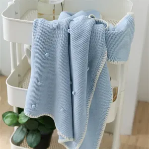 Custom soft 100% cotton plain knit baby organic falbala edge luxury pom throw dot blanket for kids gifts SKM