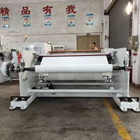 Machine de rembobinage de refendage d'étiquettes en tissu à lame chaude