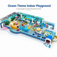 Équipement de terrain de jeux intérieur sur le thème de l'océan, structure en acier, taille personnalisable pour centre de divertissement familial, avec toboggans et piscine à balles