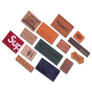Parches y etiquetas de cuero genuino en relieve con logotipo de nombre 3D personalizado de diseño al por mayor para bolsos y prendas de vestir