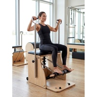 Silla de Pilates Wunda de Madera de Arce de Lujo con Pedal Dividido para el Hogar Privado, Santuario de Bienestar y Entrenamiento de Core de Alta Gama